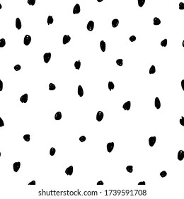 Hand drawn polka dot texture. Modern graphic black and white tileable print design. Seamless pattern. 