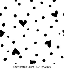 Hand drawn polka dots and hearts seamless pattern
