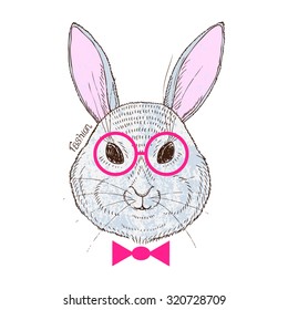 Hand drawn portrait of a fashion rabbit. Can be used to design for T-shirt, card, poster, invitation. Hipster rabbit with pink glasses and bow tie. Vector illustration