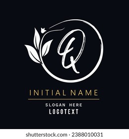 hand drawn Q letters Logo design. Brushstroke Q Letter Logo Design. luxury initial Q logo design isolated leaf and flower.eps8