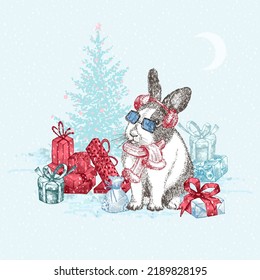 Hand drawn rabbit in red winter hat and scarf. Bunny symbol Chinese New Year 2023. Christmas tree, gifts, decor. Snowy background. Xmas holiday card. Engraving style design. Vector illustration