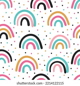Hand drawn Rainbows and dots cute seamless pattern on white background. Design for nursery, textile,fabric,wallpaper and more.