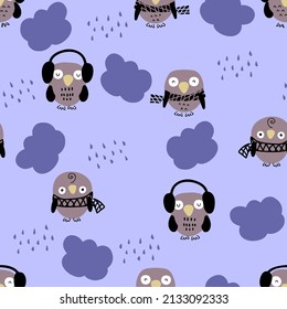 Hand drawn rainy seamless pattern with owls, clouds and drops. Perfect for T-shirt, textile and prints. Cartoon style vector illustration for decor and design.