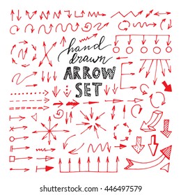 Hand drawn red arrows set on white background