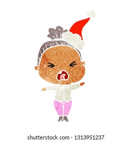 hand drawn retro cartoon of a angry old woman wearing santa hat