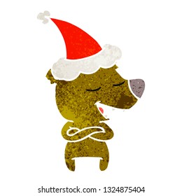 hand drawn retro cartoon of a bear wearing santa hat