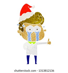 hand drawn retro cartoon of a crying man wearing santa hat