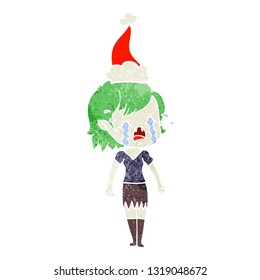 hand drawn retro cartoon of a crying vampire girl wearing santa hat