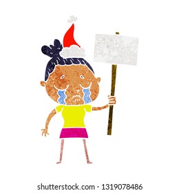 hand drawn retro cartoon of a crying woman with protest sign wearing santa hat