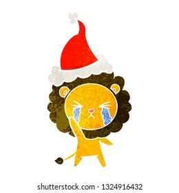 caricatura retro dibujada a mano de un león llorando con sombrero santa