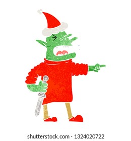 hand drawn retro cartoon of a goblin with knife wearing santa hat