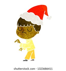 hand drawn retro cartoon of a grumpy boy wearing santa hat