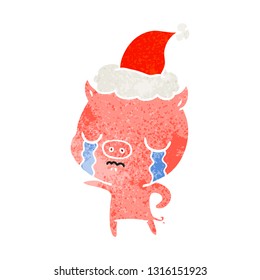 hand drawn retro cartoon of a pig crying wearing santa hat