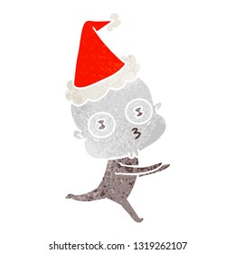 hand drawn retro cartoon of a weird bald spaceman running wearing santa hat