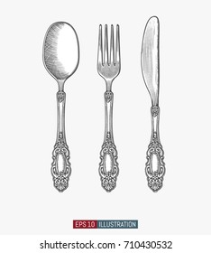 Hand drawn retro spoon, fork and knife. Engraved style vector illustration. Elements for your design works.