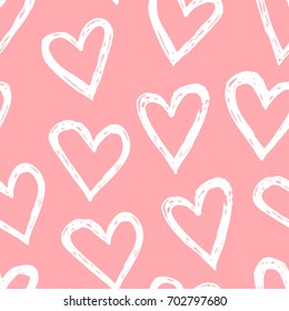 Hand drawn romantic seamless pattern. Valentine's Day background. Pink abstract  doodle drawing. Vector art illustration hearts