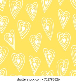 Hand drawn romantic seamless pattern. Female background. Yellow abstract  doodle drawing. Vector art illustration hearts