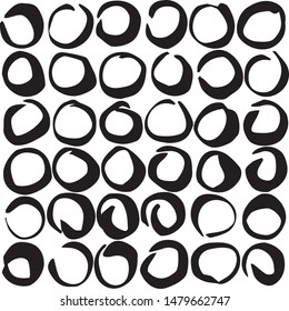 Hand drawn rough circular motifs in strict grid like form, to create primi9tive, modern pattern