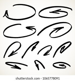 Hand drawn round and curve arrows set. Collection of symbols in black isolated over white background. Vector illustration.