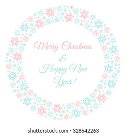 Hand drawn round frame made of snowflakes. Merry Christmas and Happy New Year template. Greeting card with circle made of brush or pencil drawn snow crystals.