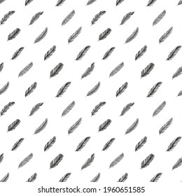 Hand drawn rustic ethnic decorative feathers. Vector seamless pattern. Tribal bird feathers ornament. Vector ink illustration isolated on white background. Ethnic boho style hand drawing