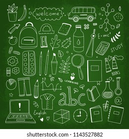 Hand drawn school elements on green board. Sketch graphic collection with different school icons and symbols