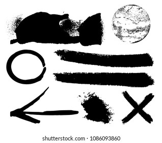 Hand drawn scribble symbols isolated on white background. Doodle style sketched Elements. Ink blots. Vector Grunge Brushes Stroke . Circle Frame. Logo Design . Crosses, arrows.