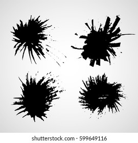 Hand drawn scribble symbols isolated on white background. Doodle style sketched Elements. Ink blots. Grunge black stains.