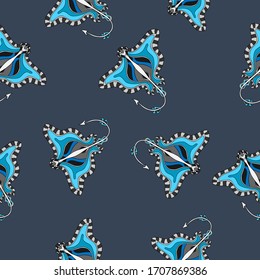 Hand drawn sea stingrays with blue, white and gray elements on calm dark purple background. Seamless underwater animal pattern.