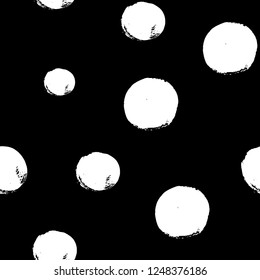 Hand drawn seamles pattern with textured circles. Uneven polka dot design, Vector illustration.