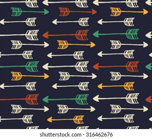 Hand drawn seamless background with Indian arrows. Vector pattern
