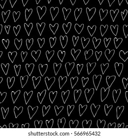 Hand drawn seamless black and white pattern made of hearts.