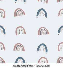 Hand drawn Seamless childish Pattern with rainbows on blue background. Modern creative Scandinavian kids texture for wallpaper, fabric, wrapping, apparel, textile. Vector illustration.