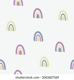 Hand drawn Seamless childish Pattern with rainbows on light background. Modern creative naive  kids texture for wallpaper, fabric, wrapping, apparel, textile. Vector illustration.