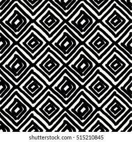 Hand drawn seamless diamond shapes pattern in black and cream. Modern textile, wall art, wrapping paper, wallpaper design.