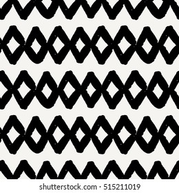 Hand drawn seamless diamond shapes pattern in black and cream. Modern textile, wall art, wrapping paper, wallpaper design.