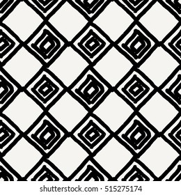 Hand drawn seamless diamond shapes pattern in black and cream. Modern textile, wall art, wrapping paper, wallpaper design.