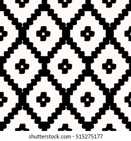 Hand drawn seamless diamond shapes pattern in black and cream. Modern textile, wall art, wrapping paper, wallpaper design.