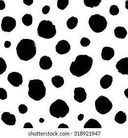 Hand drawn seamless dot pattern. Dry brush and rough edges ink illustration. Abstract vector background