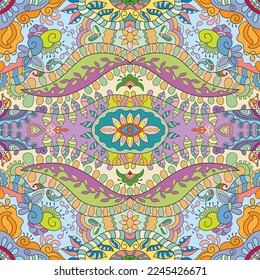 Hand drawn seamless graphic pattern, colorful artistic background with floral and geometric elements. Doodle ethnic mandala ornament for textile fabric, paper print. Surface texture 