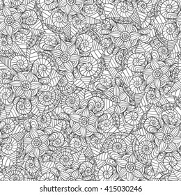 Hand drawn seamless mandala flowers pattern 