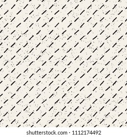 Hand drawn seamless pattern. Abstract geometric shapes background in black and white. Vector ethnic style grungy texture.