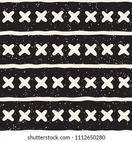 Hand drawn seamless pattern. Abstract geometric shapes background in black and white. Vector ethnic style grungy texture.