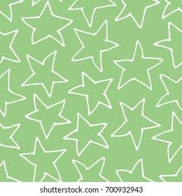 Hand drawn seamless pattern. Abstract green doodle background. Vector art illustration stars