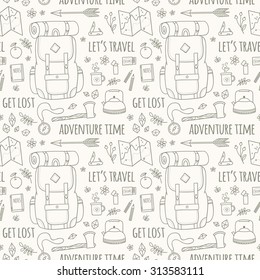 Hand drawn seamless pattern with adventure travel icons.