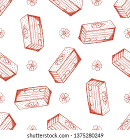 Hand drawn seamless pattern with almond cake. Can be used as texture for fabric,as background for gift cards, in web design, as pattern for wallpaper and etc