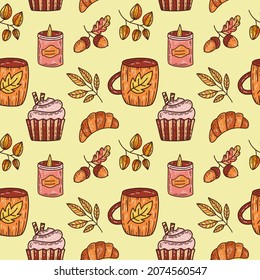Hand drawn seamless pattern with autumn leaves and caffee mugs, croissants, bright fall elements.