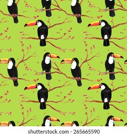 Hand drawn seamless pattern with big black toucans birds on the branches on the green background