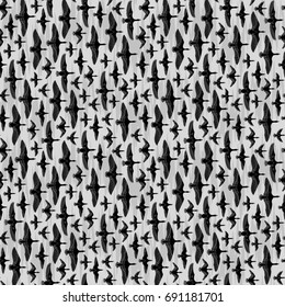 Hand drawn seamless pattern of birds flying 