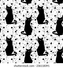 Hand drawn seamless pattern with black cats . Vector 